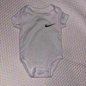 Nike White Infant Bodysuit with Black Swoosh